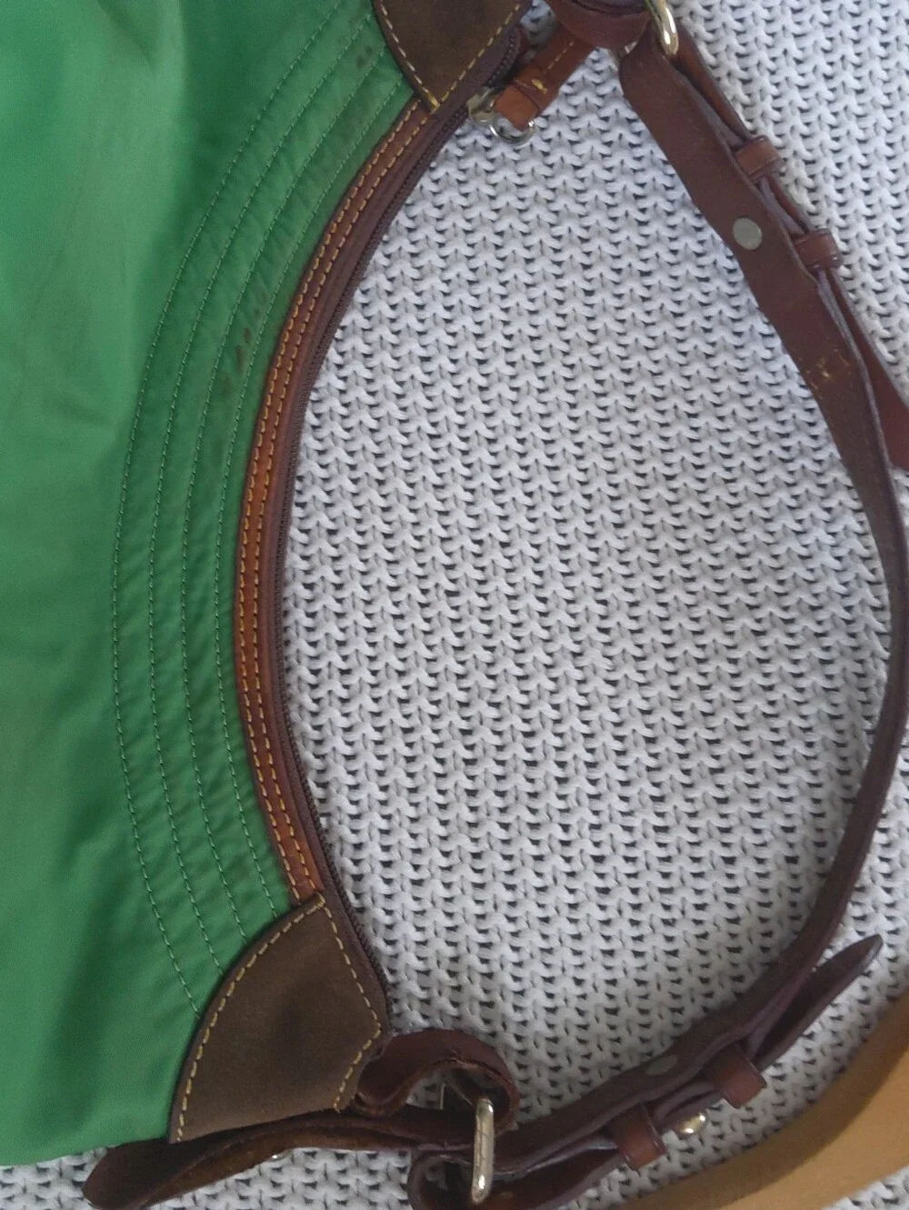 Dooney & Bourke sides stitched